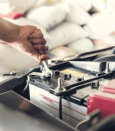 Technician installing home battery system