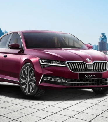 Skoda technician performing periodic service and diagnostics in Amravati